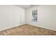 Neutral bedroom featuring a window with blinds and carpeted flooring at 103 Case Ct, Ladson, SC 29456