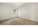Clean, carpeted bedroom with a window providing natural light at 103 Case Ct, Ladson, SC 29456