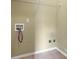 Practical laundry room with connections for a washer and dryer, and ample storage space at 103 Case Ct, Ladson, SC 29456