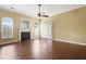 Spacious living room featuring a fireplace, ceiling fan, and hardwood floors at 103 Case Ct, Ladson, SC 29456