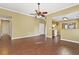 Open living space with hardwood floors and views of the kitchen, hallway, and microwave oven at 103 Case Ct, Ladson, SC 29456