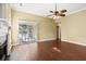 Bright living room featuring hardwood floors, large sliding doors, and a fireplace for a comfortable and inviting atmosphere at 103 Case Ct, Ladson, SC 29456