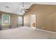 Spacious main bedroom featuring vaulted ceiling, ceiling fan, and an adjoining bathroom at 103 Case Ct, Ladson, SC 29456