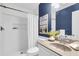 Stylish bathroom featuring a tiled shower, modern fixtures, and neutral-toned vanity at 105 Conductor Ct, Summerville, SC 29486