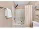 Bathroom with tub/shower, white subway tile, decorative paintings, and a towel rack at 105 Conductor Ct, Summerville, SC 29486