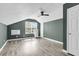 Bedroom featuring sleek laminate floors and a large window with an air conditioner at 105 Conductor Ct, Summerville, SC 29486