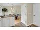 Dining area with table, chairs, natural light, and view to kitchen at 105 Conductor Ct, Summerville, SC 29486