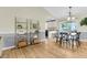 Light-filled dining area that connects the kitchen and living area with sliding door access at 105 Conductor Ct, Summerville, SC 29486
