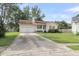 Charming single-story home featuring a well-maintained lawn and attached two-car garage at 105 Conductor Ct, Summerville, SC 29486