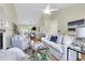 Bright living room with modern decor, plush seating, and view to outdoor dining at 105 Conductor Ct, Summerville, SC 29486
