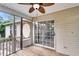 Covered back patio with a ceiling fan and access to a screened in porch area at 105 Conductor Ct, Summerville, SC 29486