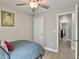 View of a bedroom leading to another room with stylish flooring and neutral paint at 1069 Lexi Ct, Ladson, SC 29456