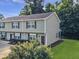 Two-story townhouse with light gray siding, landscaped front, and a well-maintained lawn at 1069 Lexi Ct, Ladson, SC 29456