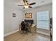 Functional home office space bathed in natural light with hardwood flooring at 1069 Lexi Ct, Ladson, SC 29456