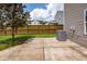 A backyard view featuring a concrete patio and a lush lawn at 107 Brookhaven Rd, Summerville, SC 29486