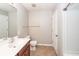 This is a bathroom with a shower/tub combo, toilet, wood vanity, and mirror at 107 Brookhaven Rd, Summerville, SC 29486