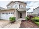 Charming two-story home with a well-maintained lawn, featuring a two car garage and neutral color palette at 107 Brookhaven Rd, Summerville, SC 29486