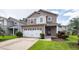 Charming two-story home with a well-maintained lawn, featuring a two car garage and neutral color palette at 107 Brookhaven Rd, Summerville, SC 29486