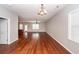 Spacious living area with stylish wood floors, complemented by natural light and open concept design at 107 Brookhaven Rd, Summerville, SC 29486