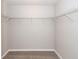 Spacious walk-in closet featuring neutral paint and carpet with metal shelving for optimal storage at 107 Brookhaven Rd, Summerville, SC 29486