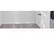Bedroom features neutral carpet, a white door, and coordinating trim at 110 Cardinal Flower Ct, Moncks Corner, SC 29461