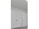 Bedroom closet with white door and door handle at 110 Cardinal Flower Ct, Moncks Corner, SC 29461