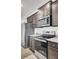 Modern kitchen showcasing stainless steel appliances and granite countertops at 110 Cardinal Flower Ct, Moncks Corner, SC 29461