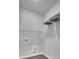 The laundry room has white walls and wire shelving at 110 Cardinal Flower Ct, Moncks Corner, SC 29461