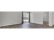 Bright living room with luxury vinyl plank flooring, white walls, and backyard access at 110 Cardinal Flower Ct, Moncks Corner, SC 29461