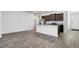 Open concept kitchen and living room featuring tile flooring at 110 Cardinal Flower Ct, Moncks Corner, SC 29461
