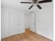 Bright bedroom with hardwood floors, with closet and doorways visible at 1121 Armstrong Ave, Charleston, SC 29407