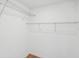 A white closet with metal racks and light wood floors at 1121 Armstrong Ave, Charleston, SC 29407