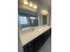 Bright bathroom with double sinks, a large mirror, and plenty of counter space for a convenient and stylish design at 118 Magnolia House Dr, Summerville, SC 29486