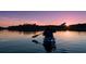 Personal paddles kayak on a lake during sunset at 118 Magnolia House Dr, Summerville, SC 29486