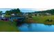 Person paddle boarding down the community river under a bridge at 118 Magnolia House Dr, Summerville, SC 29486