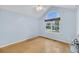 Bright bedroom with vaulted ceiling, hardwood floors, and a large window at 1309 Llewellyn Rd, Mount Pleasant, SC 29464