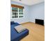 Cozy bedroom with hardwood floors, large window, and a comfortable bed at 1309 Llewellyn Rd, Mount Pleasant, SC 29464
