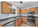 Well-equipped kitchen with stainless steel appliances, wood cabinets and durable countertops at 1309 Llewellyn Rd, Mount Pleasant, SC 29464