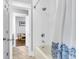Bright bathroom with a tub/shower combo and white shower tile at 1392 Founders Way, Mount Pleasant, SC 29464
