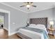 Bright bedroom with a large bed and a ceiling fan, offering a cozy and inviting space at 1392 Founders Way, Mount Pleasant, SC 29464