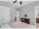 Bright bedroom with fresh linens and an open doorway to the bathroom at 1392 Founders Way, Mount Pleasant, SC 29464