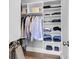 Organized closet with built-in shelving and ample storage space for clothing and accessories at 1392 Founders Way, Mount Pleasant, SC 29464