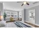 Bright and airy main bedroom with hardwood floors and ensuite bathroom at 1392 Founders Way, Mount Pleasant, SC 29464