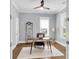 Bright office featuring a modern desk, shelving, and an inviting chair at 1392 Founders Way, Mount Pleasant, SC 29464
