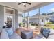 Relaxing screened patio featuring comfortable seating and an open view of the backyard at 1392 Founders Way, Mount Pleasant, SC 29464
