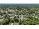 Aerial view of neighborhood showing mature trees, water features and golf course at 15 A Par Dr # 27, Charleston, SC 29414