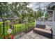 Picturesque backyard view with a patio, seating, lush greenery, and a serene pond, creating a tranquil setting at 15 A Par Dr # 27, Charleston, SC 29414