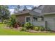 Beautiful landscaping, lush green grass, and exterior details of the home at 15 A Par Dr # 27, Charleston, SC 29414