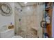 Shower features tiled walls, a built-in bench and glass door enclosure at 15 A Par Dr # 27, Charleston, SC 29414