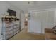 Versatile bedroom featuring closet, seating area, and access to kitchen for convenient living at 15 A Par Dr # 27, Charleston, SC 29414
